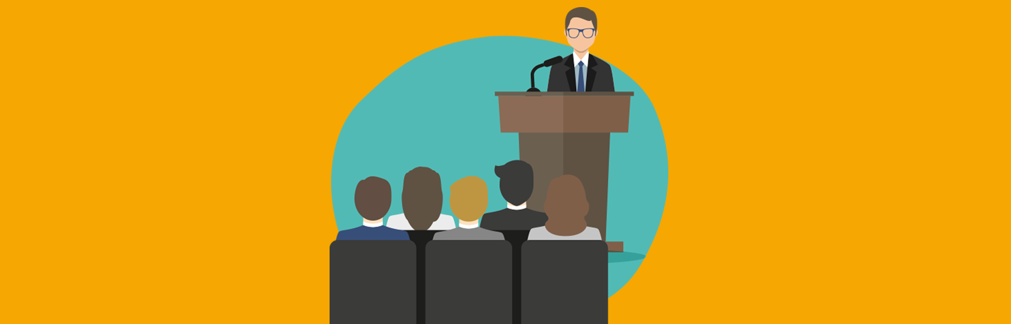 Man Speaking on Stage